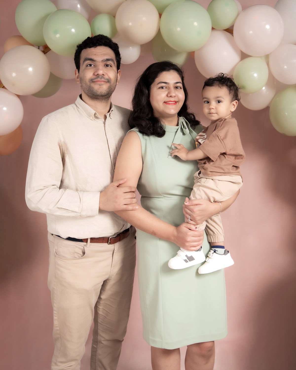 Parents and toddler family portrait