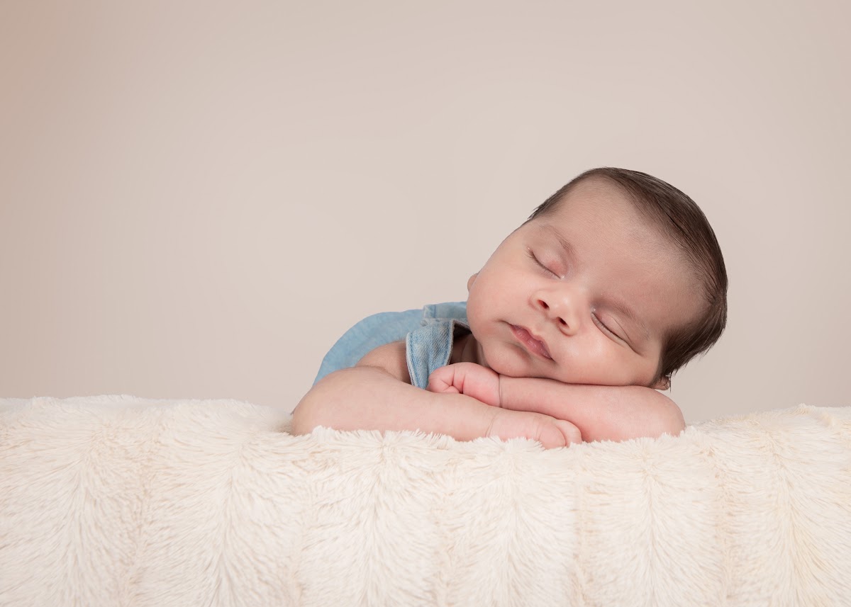 Sleeping newborn baby close portrait